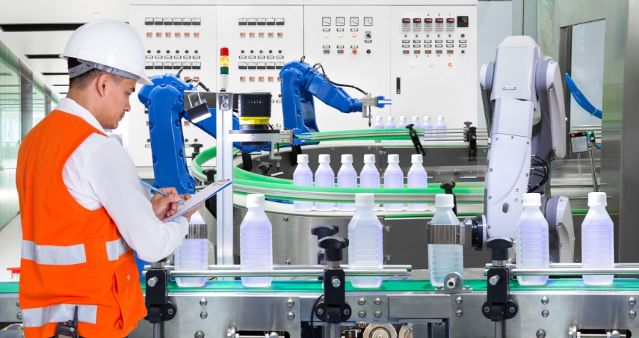 Man making sure the CMD materials handling units are running properly